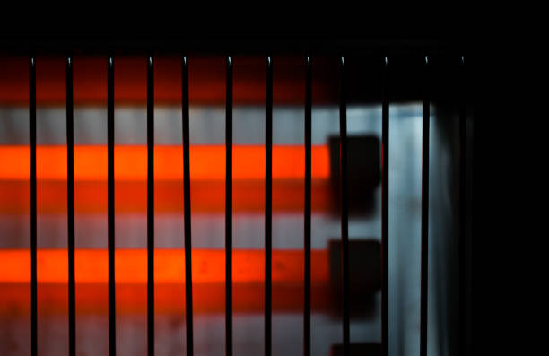 electric heater abstract background device hot electric heater abstract background device hot halogen light stock pictures, royalty-free photos & images