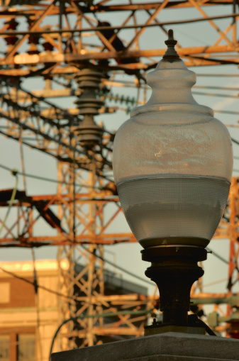 Light fixture with transformer station in the background