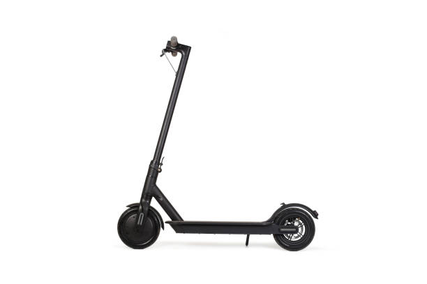 Electric scooter in a isolated view Black electric scooter in a isolated view motor scooter stock pictures, royalty-free photos & images