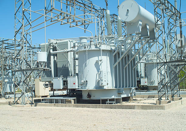 Electrical transformer sub-station Electrical utility transformer sub-station. electricity transformer stock pictures, royalty-free photos & images