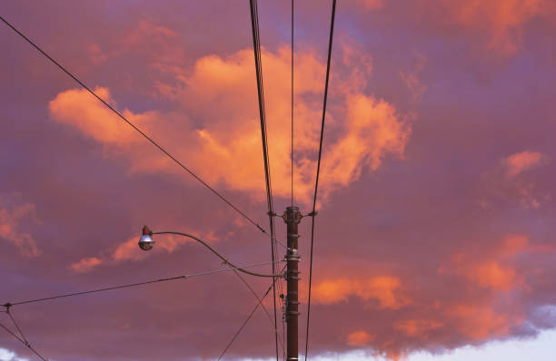 Electrical Wires under a Sunset Sky stock photo