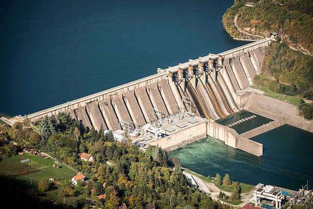 Electricity from hydropower plants Electricity from hydropower plants dam stock pictures, royalty-free photos & images