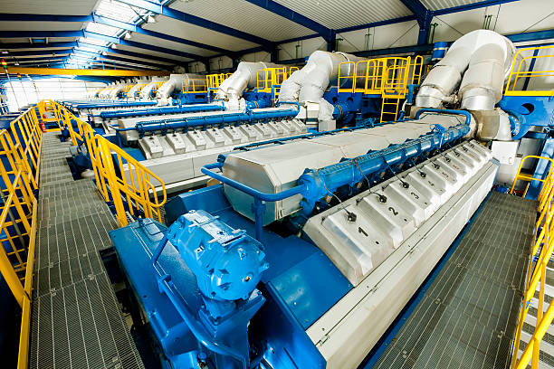 electricity generators at plant stock photo