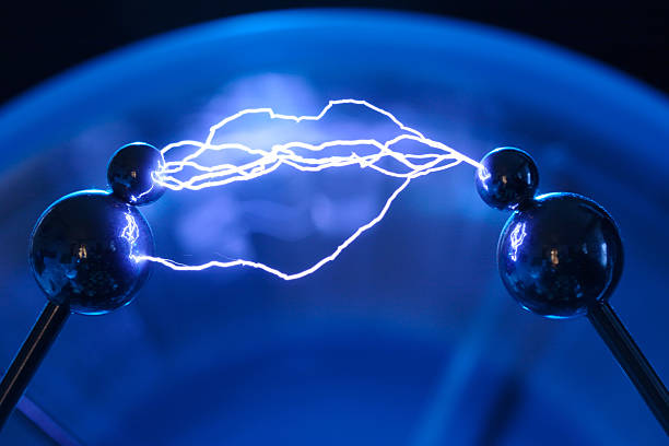 Electricity Multiple arc electrical discharge from a Wimshurst generator. electrode stock pictures, royalty-free photos & images
