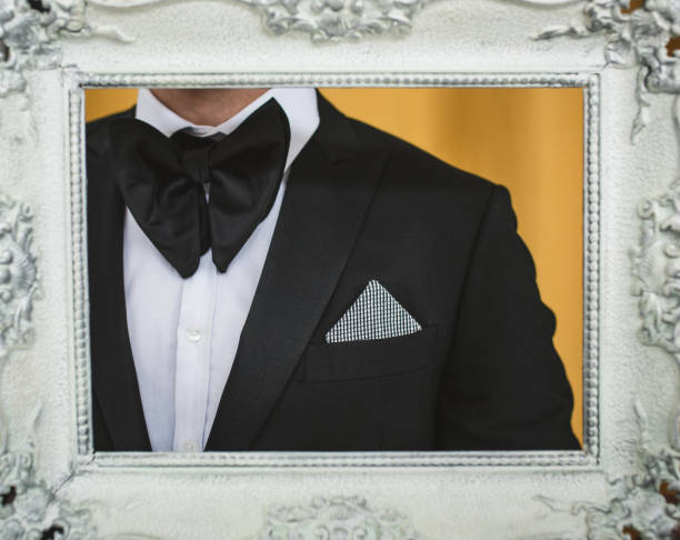 Elegant handsome young man wearing black bow tie