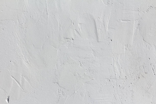 Elegant concrete wall with uneven artistic plaster stock photo