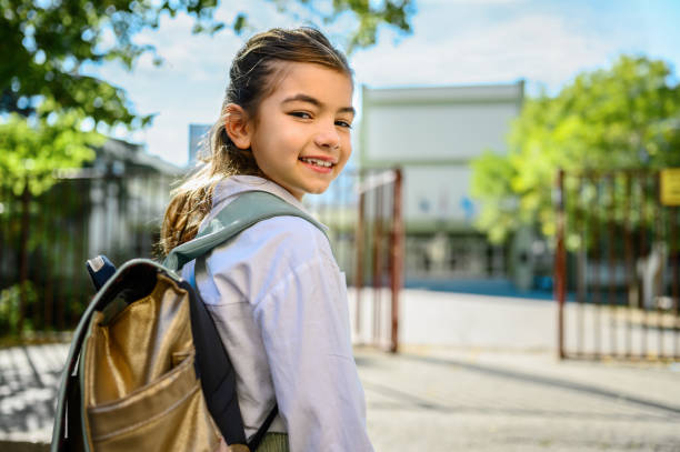 Elementary student going back to school stock photo