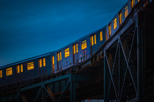 The 7 Train pulls into Queensboro Plaza in Queens, NYC. USA