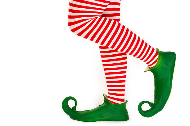 elf's legs - christmas funny stockfoto's en -beelden