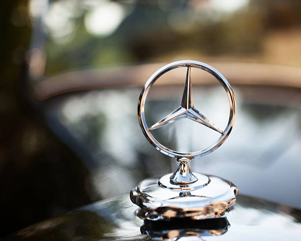 Emblem logo on a Mercedes - Benz stock photo
