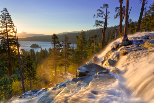 Sunrise overlooking Lake Tahoe's Emerald Bay in the background, with the upper portion of Lower Eagle Falls in the foreground; HDR.