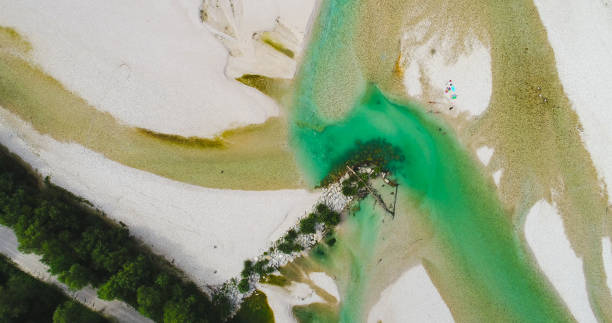 Emerald river Soca (Isonzo) near Kobarid, Slovenia, aerial view stock photo