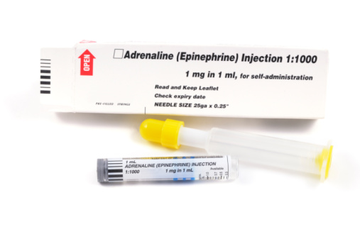 Emergency Adrenaline Epinephrine Injection isolated on white
