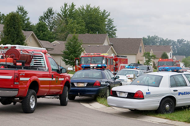 Emergency response Firetrucks and police cars came to deal with emergency situation. emergency response stock pictures, royalty-free photos & images