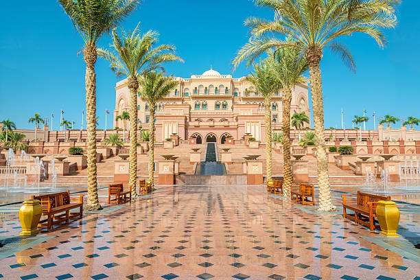 Emirates Palace Abu Dhabi UAE Walkway to the Emirates Palace in Abu Dhabi, United Arab Emirates palace stock pictures, royalty-free photos & images