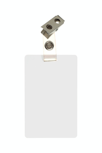 Blank indentification badge with clip on a white backgroundrelated: