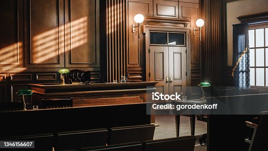 istock Empty American Style Courtroom. Supreme Court of Law and Justice Trial Stand. Courthouse Before Civil Case Hearing Starts. Grand Wooden Interior with Judge's Bench, Defendant's and Plaintiff's Tables. 1346156607