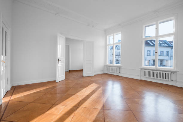 empty apartment room - flat for rent with wooden floor stock photo