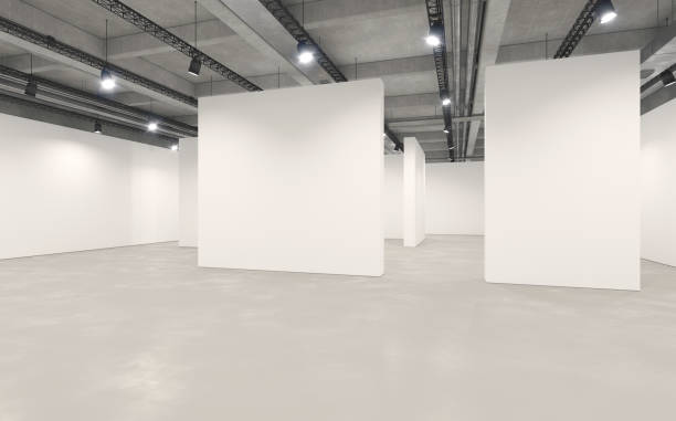Empty art gallery with white walls Large art gallery with empty walls illuminated by bright light, with rows of lighting equipment hanging from the ceiling.  Industrial architecture style. White partitioning walls and concrete ceiling. Museum space with no people, copy space. Digitally generated image. art museum stock pictures, royalty-free photos & images