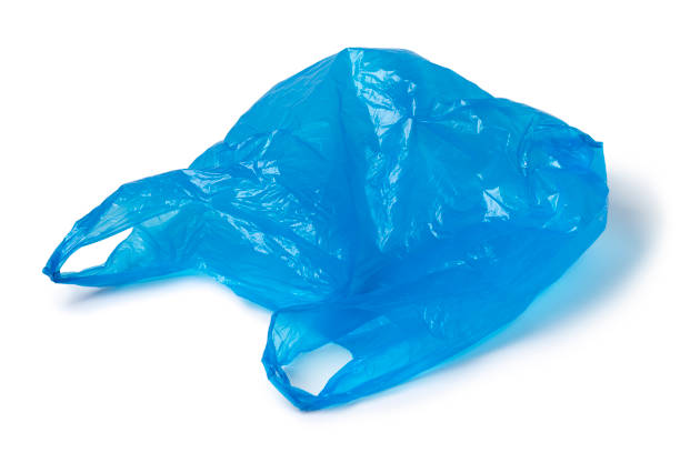 Empty blue plastic bag isolated on white background stock photo