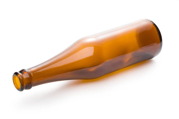 empty brown glass bottle isolated on a white background with clipping path. - empty beer bottle imagens e fotografias de stock