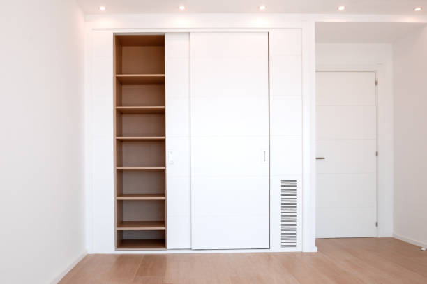 Empty built-in wardrobes. New house, empty rooms. stock photo