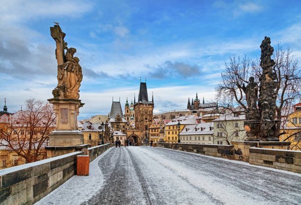 Empty Charles Bridge at winter morning, Prague Empty winter Charles Bridge, Prague charles bridge stock pictures, royalty-free photos & images