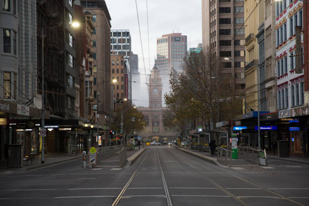 Empty City Streets During Coronavirus Restrictions Melbourne, Australia - June 8, 2020: Empty city streets in downtown Melbourne during the coronavirus restrictions. What would normally be busy streets in the early morning were largely empty. melbourne street stock pictures, royalty-free photos & images