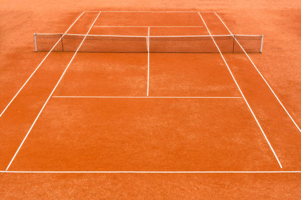Empty clay tennis court stock photo