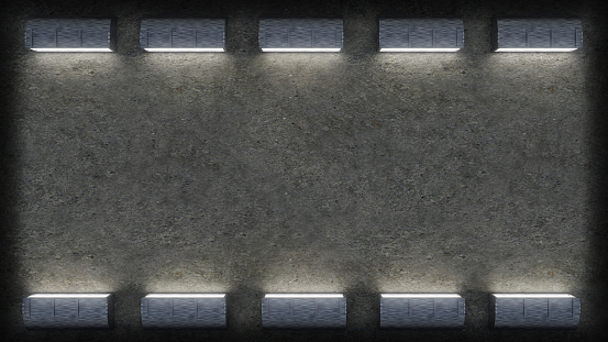Empty concrete wall spotlights