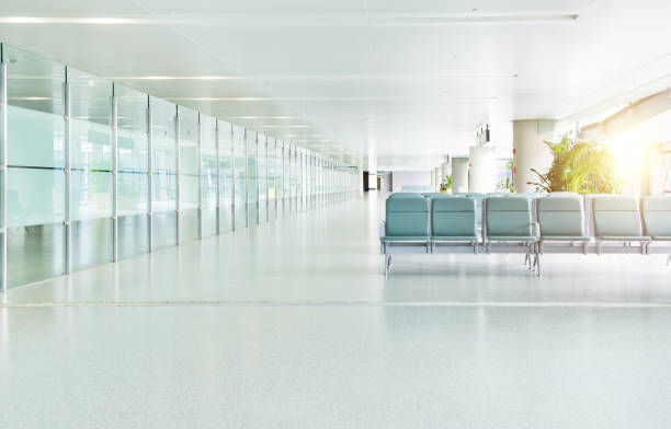 Empty departure lounge in airport stock photo