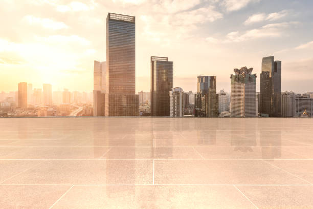 Empty floor with modern skyline and buildings stock photo