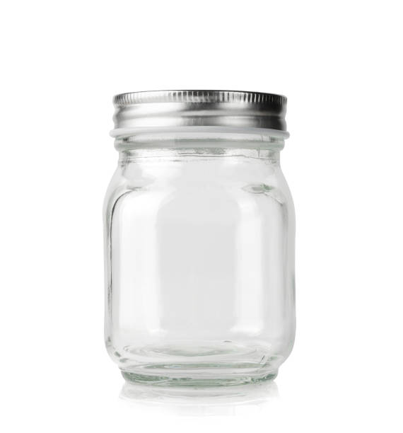lege glaspot met zilveren deksel dat op wit wordt geïsoleerd. - glazen pot stockfoto's en -beelden
