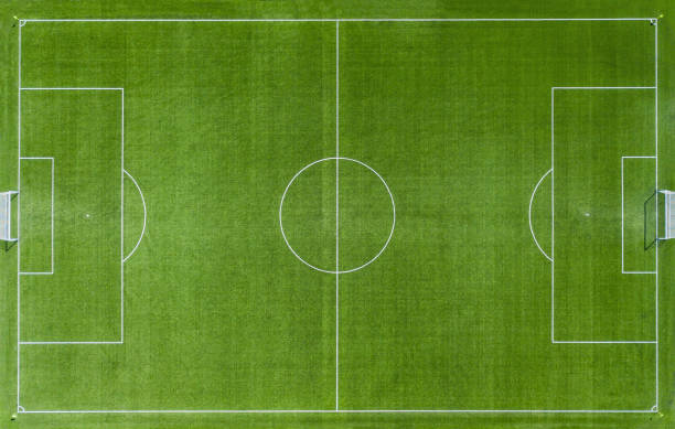 Empty Green soccer football pitch Aerial View Aerial view of Empty Green football pitch - soccer game. football field stock pictures, royalty-free photos & images