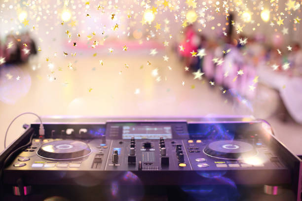 Empty hall during party or wedding celebration with dj mixer and space for text Empty hall during party or wedding celebration with dj mixer and space for text dj stock pictures, royalty-free photos & images