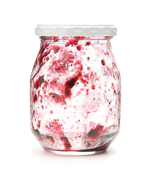 Empty jar of Blueberry jelly stock photo