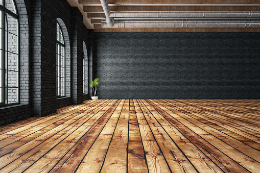Empty white brick wall with wooden parquet and black brick wall