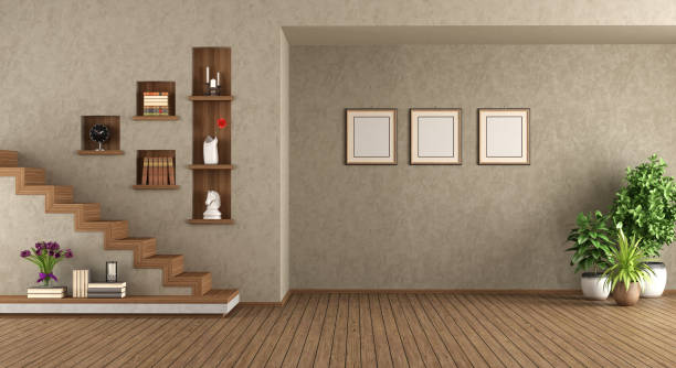 Empty living room with staircase stock photo