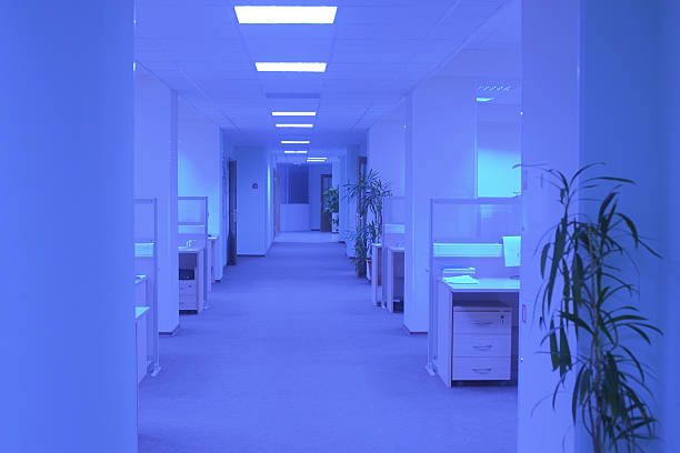 Empty office in ultraviolet light stock photo