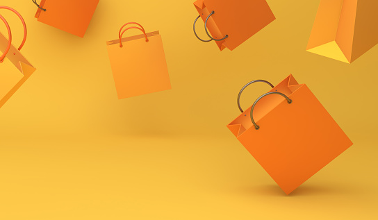 Empty Orange Color Shopping Bag On The Yellow Background Copy Space ...