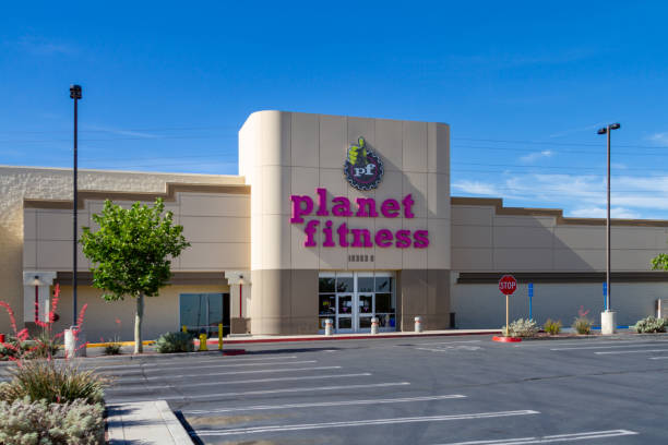 Empty parking lot at Planet Fitness stock photo