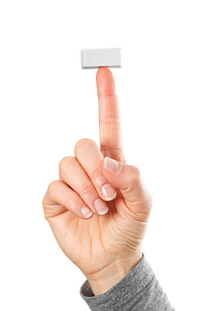 Empty rectangular key on fingertip stock photo
