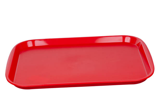 Empty Red Plastic Tray. Plastic product is an attribute of fast food enterprises. tray stock pictures, royalty-free photos & images