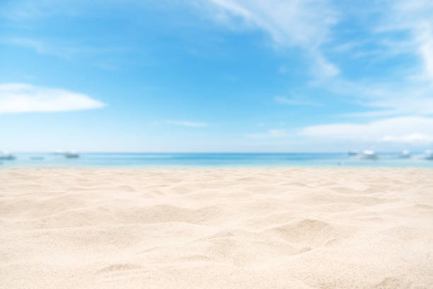 Empty sand beach with clear sky background stock photo