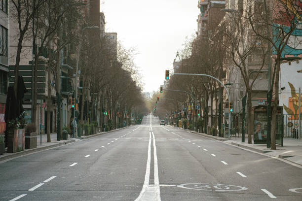 Empty street in Barcelona Empty street during the curfew in Barcelona city street stock pictures, royalty-free photos & images