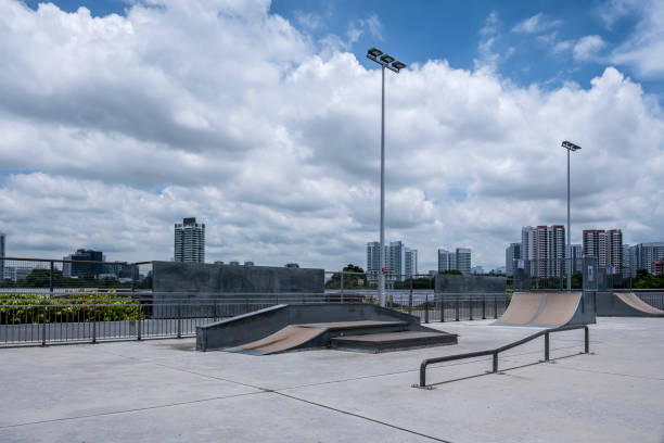 Empty Street Style Skatepark, On A Sunny Day With Dramatic Sky stock photo