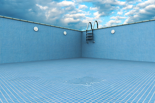 3D rendering of an empty swiming pool with the last drop of water.