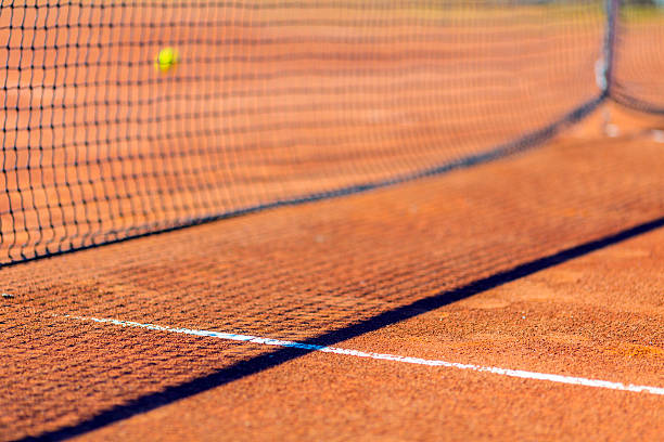 Empty tennis court at seaside Mediterranean resort stock photo