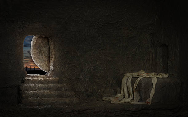 Empty Tomb of Jesus Empty tomb of Jesus with crosses in far hill tomb stock pictures, royalty-free photos & images