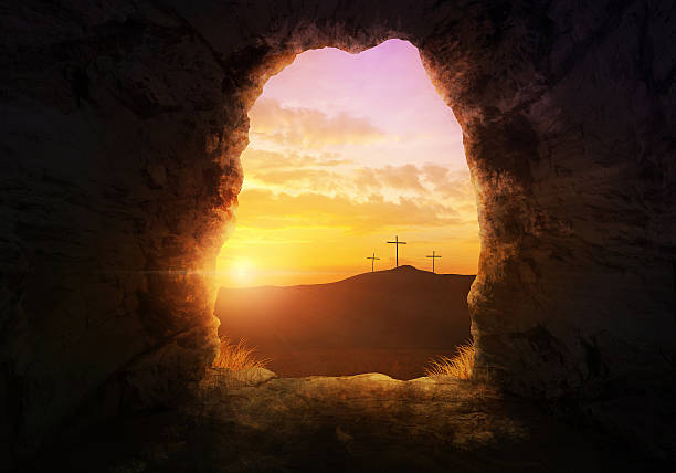 Empty tomb Empty tomb with three crosses on a hill side. tomb stock pictures, royalty-free photos & images